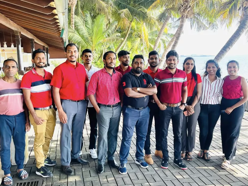 Pixzarloop team gathering by the waterfront for Christmas